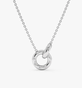 Macro view of interlocking silver double ring pendant necklace with paved zircons
