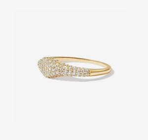Macro view of a gold-plated S925 silver ring featuring dense pave-set white zircons