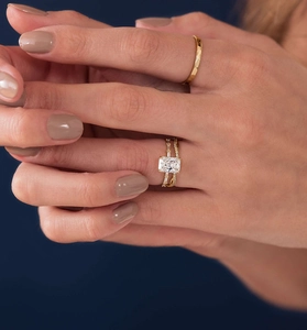Close-up of S925 silver ring set with rectangle zircon and pave stones on model hand