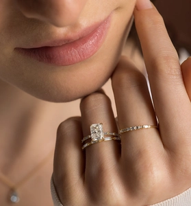 Close-up of S925 silver rings with rectangle zircon and baguette cut stones on hand
