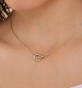 Detail of interlocking S925 sterling silver rings with crystals on an O-chain necklace