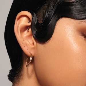Orecchini a perno curvi placcati oro 14K con zircone marquise per piercing orecchio