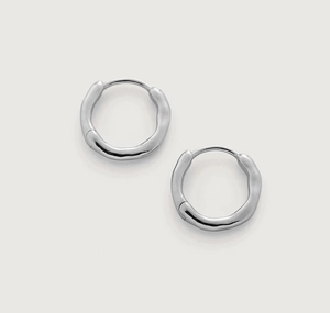 Detailed view of textured S925 sterling silver hoop earrings with irregular lava pattern