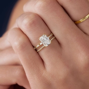 Elegant gold S925 silver stacked rings featuring a rectangular zircon and pavé diamonds