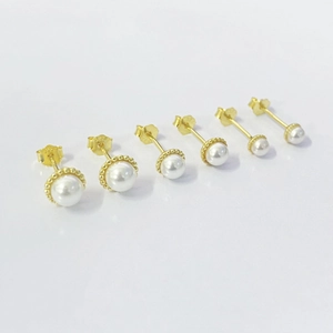 Set of three pairs of S925 sterling silver pearl stud earrings in varying sizes