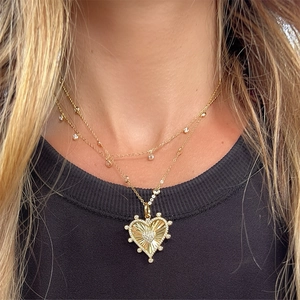 Elegant gold double-layered S925 silver necklace with heart pendant and zircon crystals