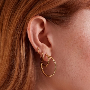 Chic S925 sterling silver gold hoop earrings with irregular organic texture for women