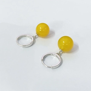 S925 sterling silver drop earrings featuring natural yellow agate round beads on white background