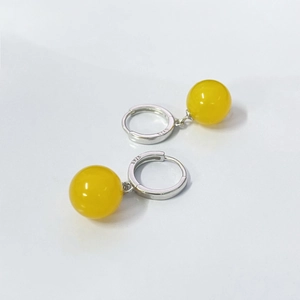 S925 Sterling silver drop earrings with natural yellow agate beads on white background
