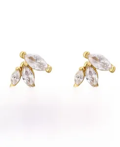Detailed macro of gold S925 sterling silver studs with marquise-cut cubic zirconia