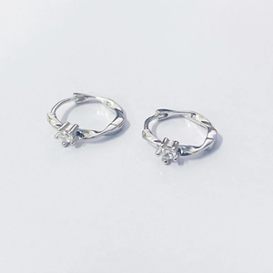 S925 sterling silver Mobius hoop earrings with sparkling cubic zirconia on white background