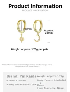 Asymmetric S925 sterling silver hoop earrings with gold star and moon charms and zircons