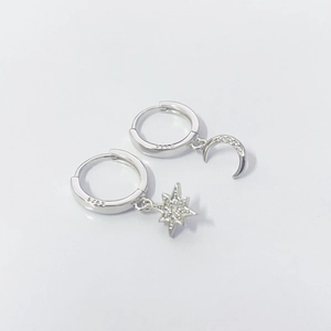 Asymmetric S925 sterling silver hoop earrings with pavé zircon star and moon charms