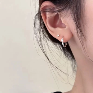 S925 sterling silver Mobius zircon hoop earrings shown on a model for a minimalist look