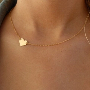 Minimalist S925 silver heart necklace with gold asymmetric heart pendant on model