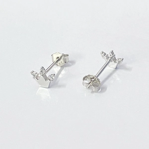 Detail view of S925 sterling silver crown stud earrings with clear zircon stones