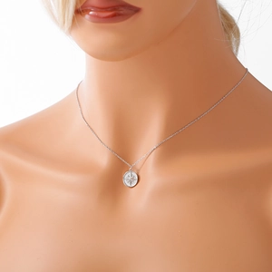 S925 sterling silver compass necklace with octagonal star pendant on a neck model