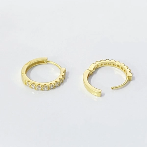 Gold S925 sterling silver huggie earrings with a single row of sparkling zircon stones