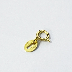 Macro shot of 18k gold plated S925 sterling silver spring ring clasp with Italy hallmark