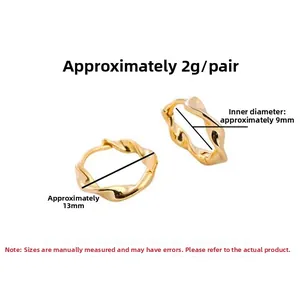 Detail of twisted gold-plated S925 silver hoop earrings with size specs 13mm x 9mm