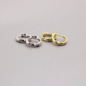Minimalist S925 sterling silver hoop earrings with irregular wave texture in gold and silver