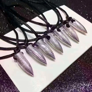 Set of 925 sterling silver bullet pendants with modern ripple texture and black cords