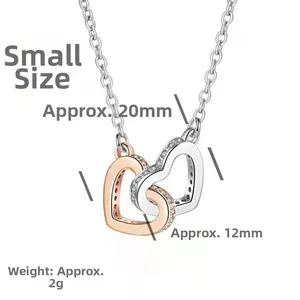 Close-up of interlocking heart pendant with rose gold and pavé zircon details