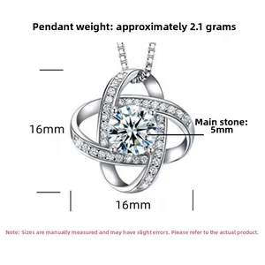 Close-up of S925 silver interlocking clover pendant with a 5mm cubic zirconia main stone