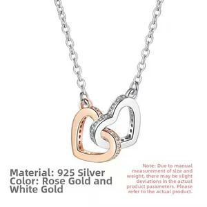 Detail of s925 silver interlocking double heart pendant with rose gold plating