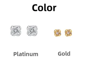 Detail view of twist knot stud earrings in silver and gold with pavé cubic zirconia