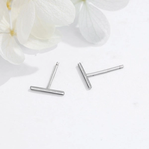 Minimalist S925 sterling silver bar stud earrings with polished finish on white background