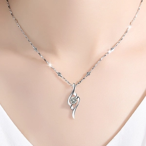 Elegant S925 silver necklace with a twisted diamond pendant on an Asian female model
