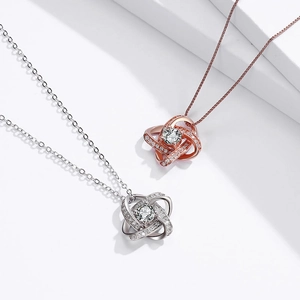 Intertwined clover necklace set in silver and rose gold with sparkling zircon pendants