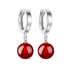 S925 sterling silver drop earrings with round red agate beads on a white background