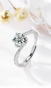 Macro view of S925 sterling silver ring with six-prong Moissanite and side stones