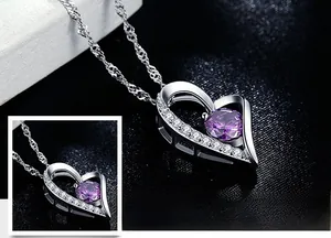 Close-up of S925 sterling silver heart pendant with purple zircon and pavé crystals