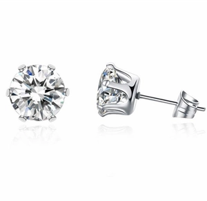 Macro detail of S925 sterling silver crown stud earrings with six-prong set cubic zirconia