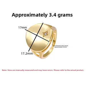 Detail of S925 sterling silver ring with gold finish and star-shaped gemstone inlay