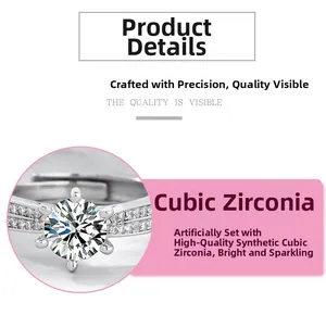 Detailed close-up of 6-prong set cubic zirconia and pavé stones on silver ring band