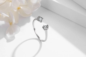 Close-up of S925 sterling silver open ring featuring double sparkling cubic zirconia