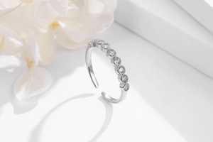 Detail of adjustable S925 silver ring featuring seven sparkling inlaid zircons