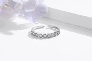 Detail view of adjustable S925 silver ring with micro-set zircon and hallmark stamp