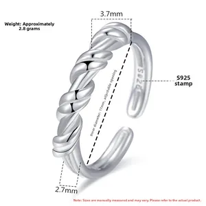Macro detail of 925 sterling silver knotted ring with S925 hallmark and dimensions