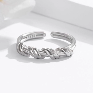 Elegant S925 sterling silver twisted knot ring with a minimalist open adjustable design