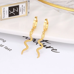 Elegant gold snake drop earrings featuring S-curve pendant with textured scale details