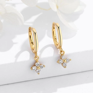 Elegant S925 sterling silver gold-plated hoop earrings with four-leaf clover zircon charms