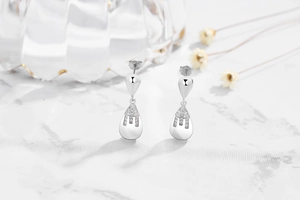 Detailed view of S925 sterling silver water-drop earrings with pavé zircon accents