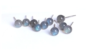 Macro detail of S925 sterling silver stamp on vintage labradorite crystal stud earrings