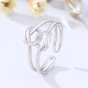 S925 sterling silver double-layer knot open ring with polished finish on white background