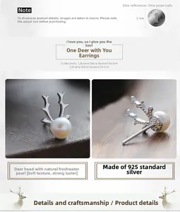 Macro view of S925 sterling silver reindeer antler earrings with white freshwater pearls